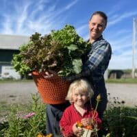 Organic Vegetable Farmer and Kid